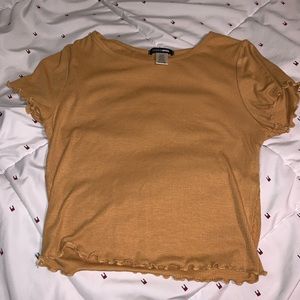Mustard crop top from Fashion Nova